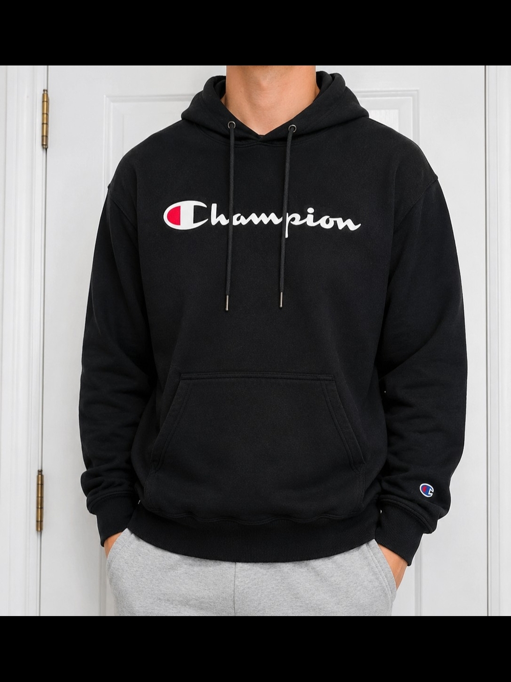 Champion Black Hoodie with White Script and Red Logo Accent